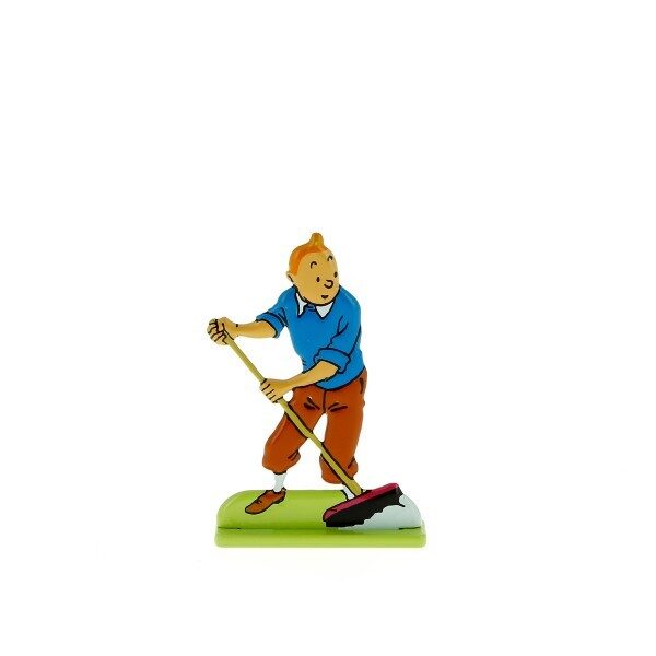 Tintin sweeping up metal figurine